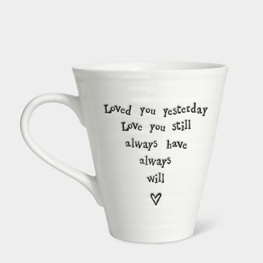 White mug with black text and heart on a white background