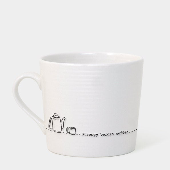 White mug with black text and illustration on a white background