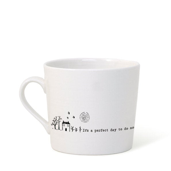White mug with black text and design on a white background