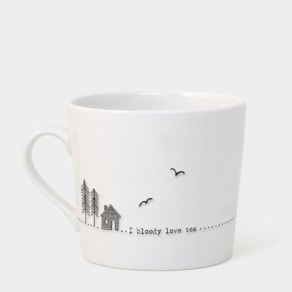 White mug with black text and illustrations on a white background