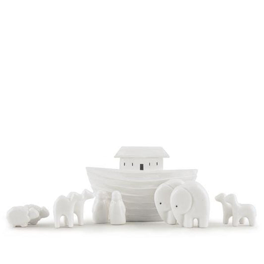 White ceramic Noah's ark with animals on a white background