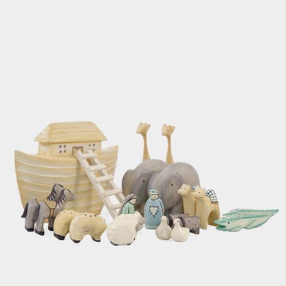 Noah's ark toy set with animals on a white background